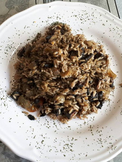 Una foto de Arroz con pota en su tinta