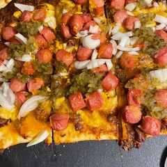 A picture of Chili dog pizza.