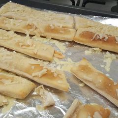 A picture of Garlic parmesam breadsticks (made in Breadmaker).