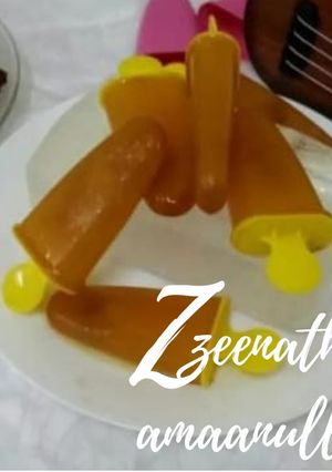 A picture of Black Tea and Orange Popsicles.