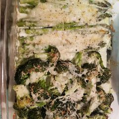 A picture of Delicious cheesy baked broccoli & asparagus.