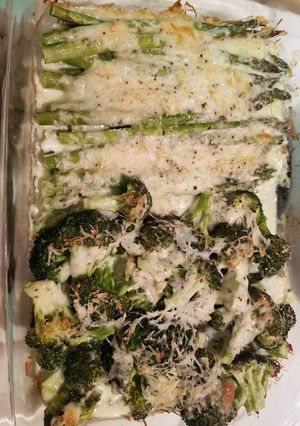 A picture of Delicious cheesy baked broccoli & asparagus.