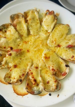 Una foto de Machas a la parmesana