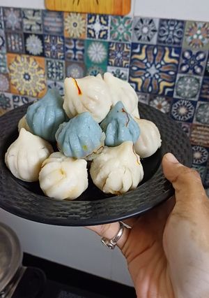 A picture of Blue Pea Cranberry Ukdiche Modak.