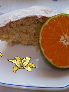 Una foto de Bizcocho de mandarina 🍊