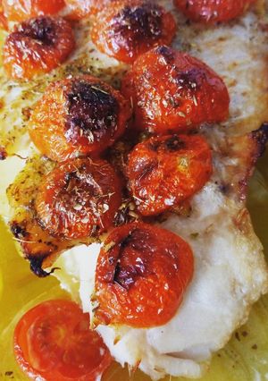 Foto di Filetto di pesce persico con patate e pomodorini