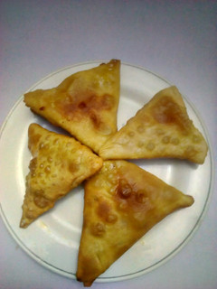 A picture of Funny red oil samosa🤣🤣🤣.