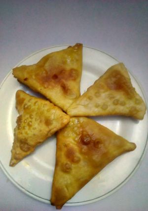 A picture of Funny red oil samosa🤣🤣🤣.