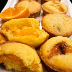 A picture of Orange cup cakes.