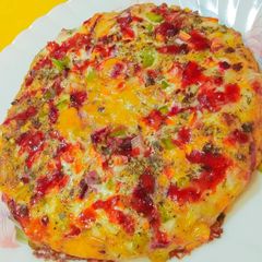 A picture of Wheat flour Tanduri sauce pizza.