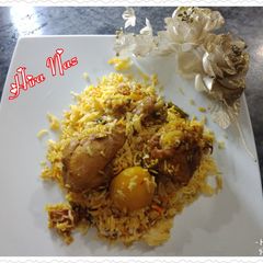 A picture of Chicken Aloo Biryani.