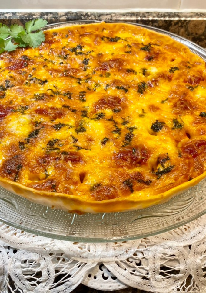 Una foto de Pizza con pisto y queso provolone