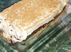 Una foto de Brazo gitano de chocolate, relleno de fresa
