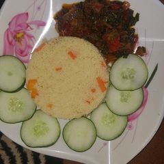 Cus cus wif vegetable soup A picture of Cus cus wif vegetable soup.