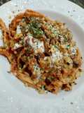 Tagliatelle di semola con funghi pomodoro fonduta di briè noci e prezzemolo