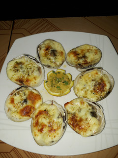 Una foto de Almejas a la parmesana