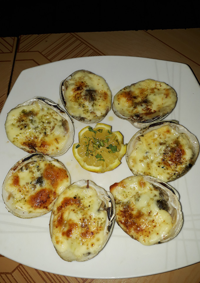 Una foto de Almejas a la parmesana