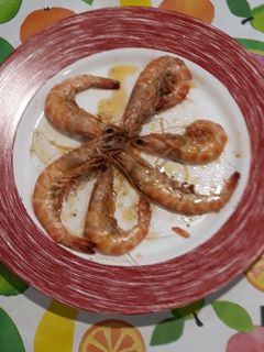 Una foto de Langostinos a la sal y limón