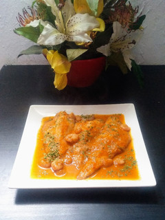 Una foto de Merluza con salsa de verduras
