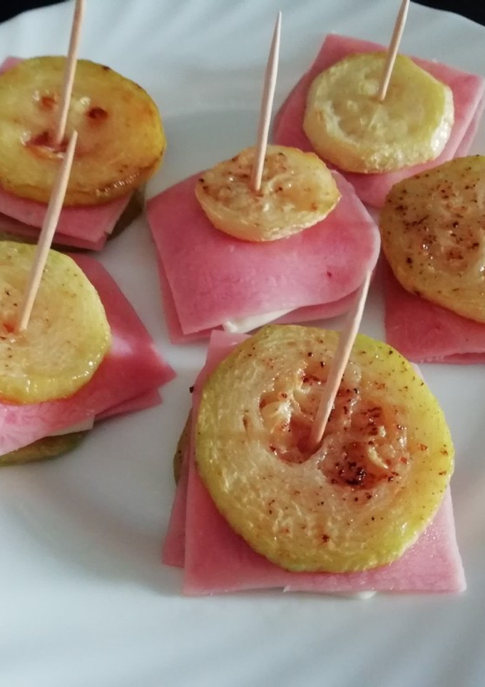 Una foto de "Bocatines" de calabacín frito