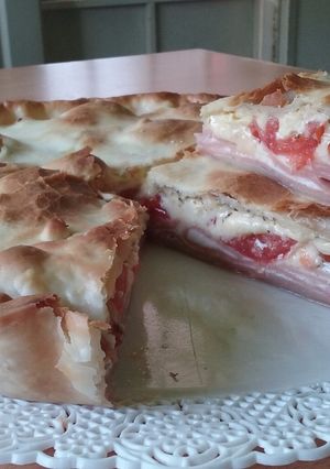 Una foto de Tarta de paleta, queso y tomate