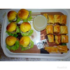 Pineapple juice with sausage Roll A picture of Pineapple juice with sausage Roll.