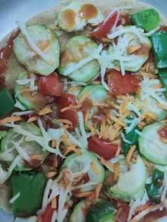 பீர்க்கங்காய் பீட்சா (peerkakangai pizza recipe in tamil) செய்முறை முக்கிய புகைப்படம்