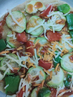 பீர்க்கங்காய் பீட்சா (peerkakangai pizza recipe in tamil) செய்முறை முக்கிய புகைப்படம்