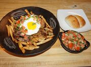 Una foto de longaniza con bistec