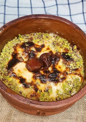صورة لوصفة أم على بالتمر والهيل
