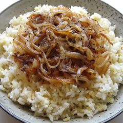A picture of Lentils Rice With Sautéed Onion.