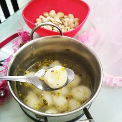 A picture of Tasty Rasagulla used by leftover Rice.