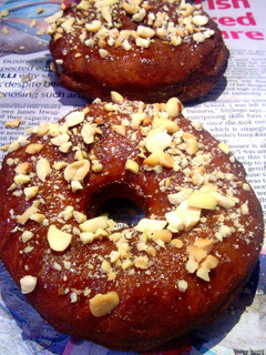 A picture of Cinnamon Peanut Glazed Doughnuts.
