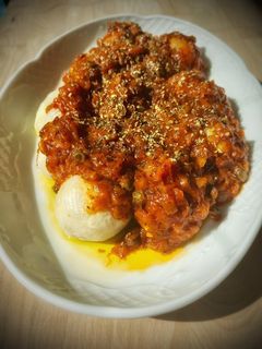 Una foto de Gnocchi de patata casero con mozzarella a la puttanesca