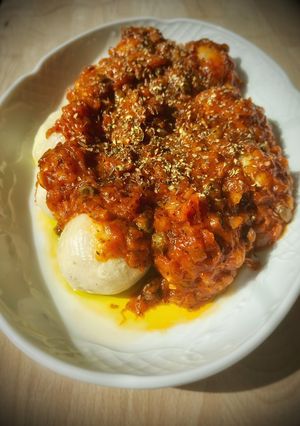 Una foto de Gnocchi de patata casero con mozzarella a la puttanesca