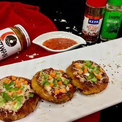 A picture of Wheat flour poha pizza schezwan patties.