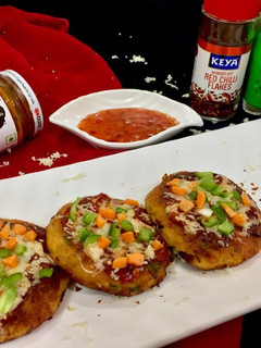 A picture of Wheat flour poha pizza schezwan patties.