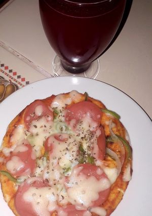 Una foto de Pizza con pan de pita