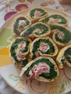 A picture of Omelet Roll with Spinach, Mozzarella, and Ham.