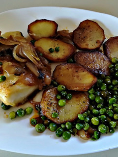 Una foto de Lomos de bacalao a la portuguesa
