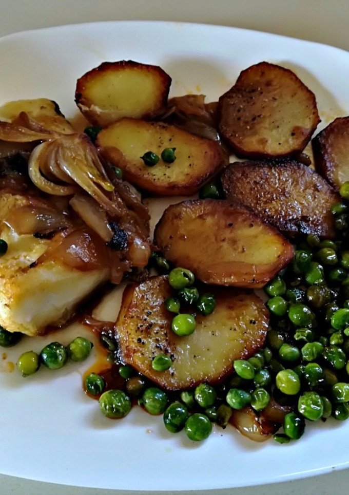 Una foto de Lomos de bacalao a la portuguesa
