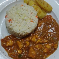 Peri peri chicken shashlik with fried rice A picture of Peri peri chicken shashlik with fried rice.