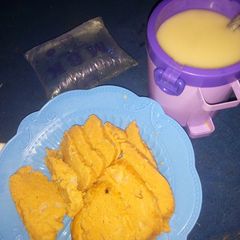 A picture of Moimoi(beans cake) and pap with water.