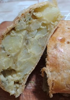 Foto di Rotolo di pasta sfoglia con patate e carciofi