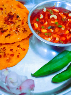 A picture of Restaurant style tasty and masaledar Kaju masala curry with butter roti.
