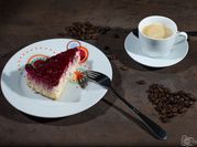 Una foto de cheesecake con queso crema