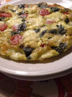 Foto di Frittata con piselli,prosciutto e provola aromatizzata con succo di limone