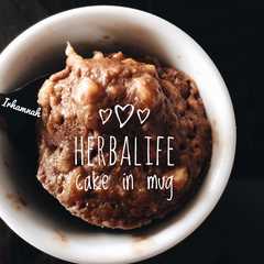 A picture of Herbalife cake in mug.