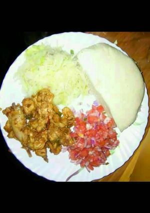A picture of Fried beef and salad.