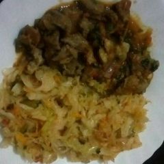 A picture of Beef stew and Stir fried cabbages.